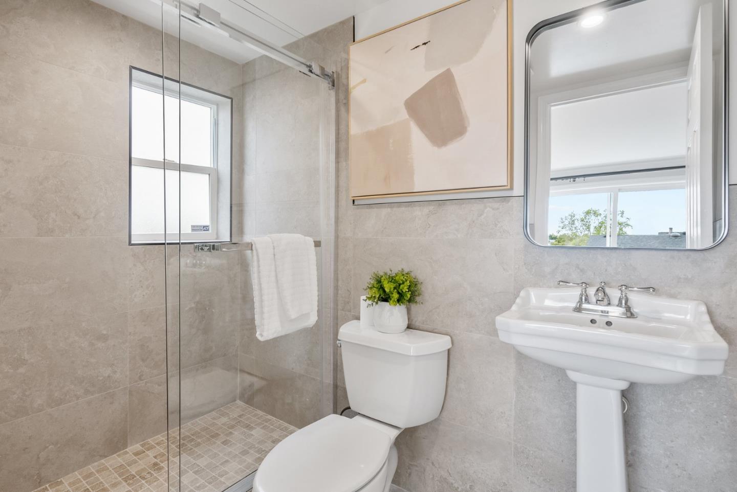 511 Bayview Avenue Millbrae, CA 94030 - Photo 23 of 36 a bathroom with a sink toilet and shower