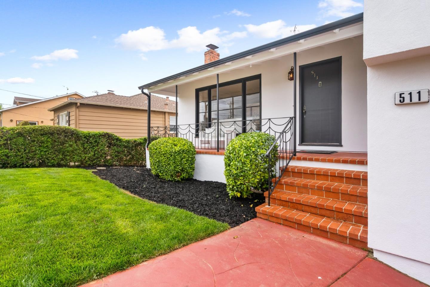 511 Bayview Avenue Millbrae, CA 94030 - Photo 3 of 36 a front view of a house with garden