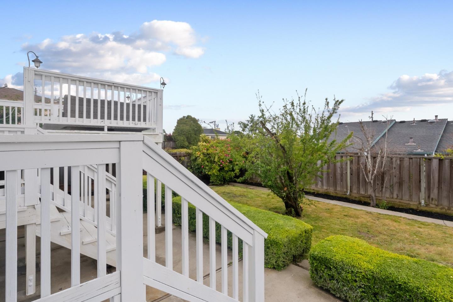 511 Bayview Avenue Millbrae, CA 94030 - Photo 33 of 36 a view of a house with wooden fence