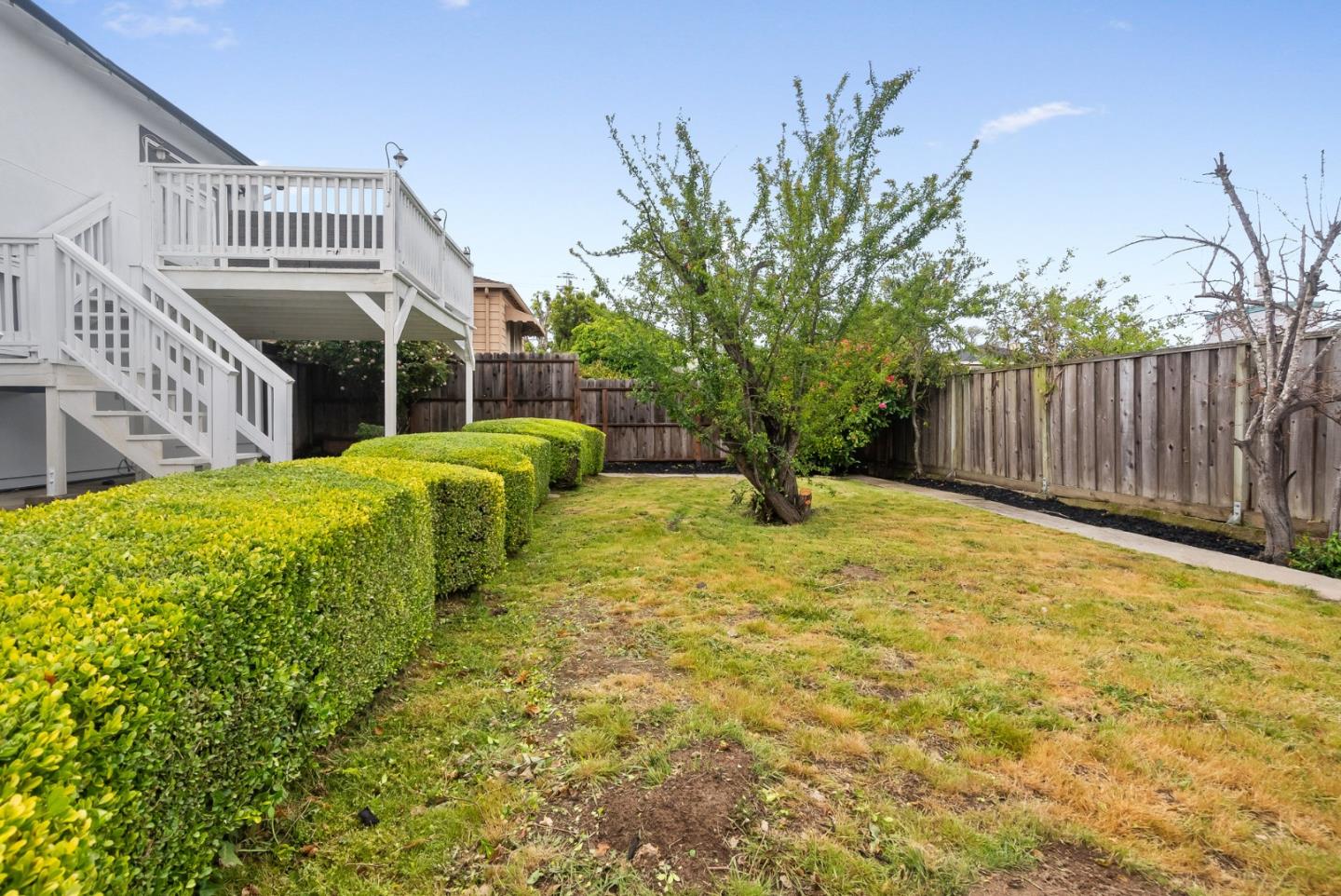511 Bayview Avenue Millbrae, CA 94030 - Photo 34 of 36 a view of a house with a yard