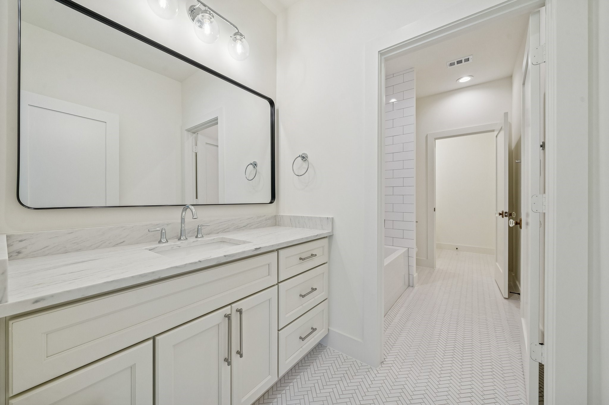 511 Graceland Street Houston, TX 77009 - Photo 34 of 45 Another view of the hollywood bath from the secondary bedroom at the back of the house.