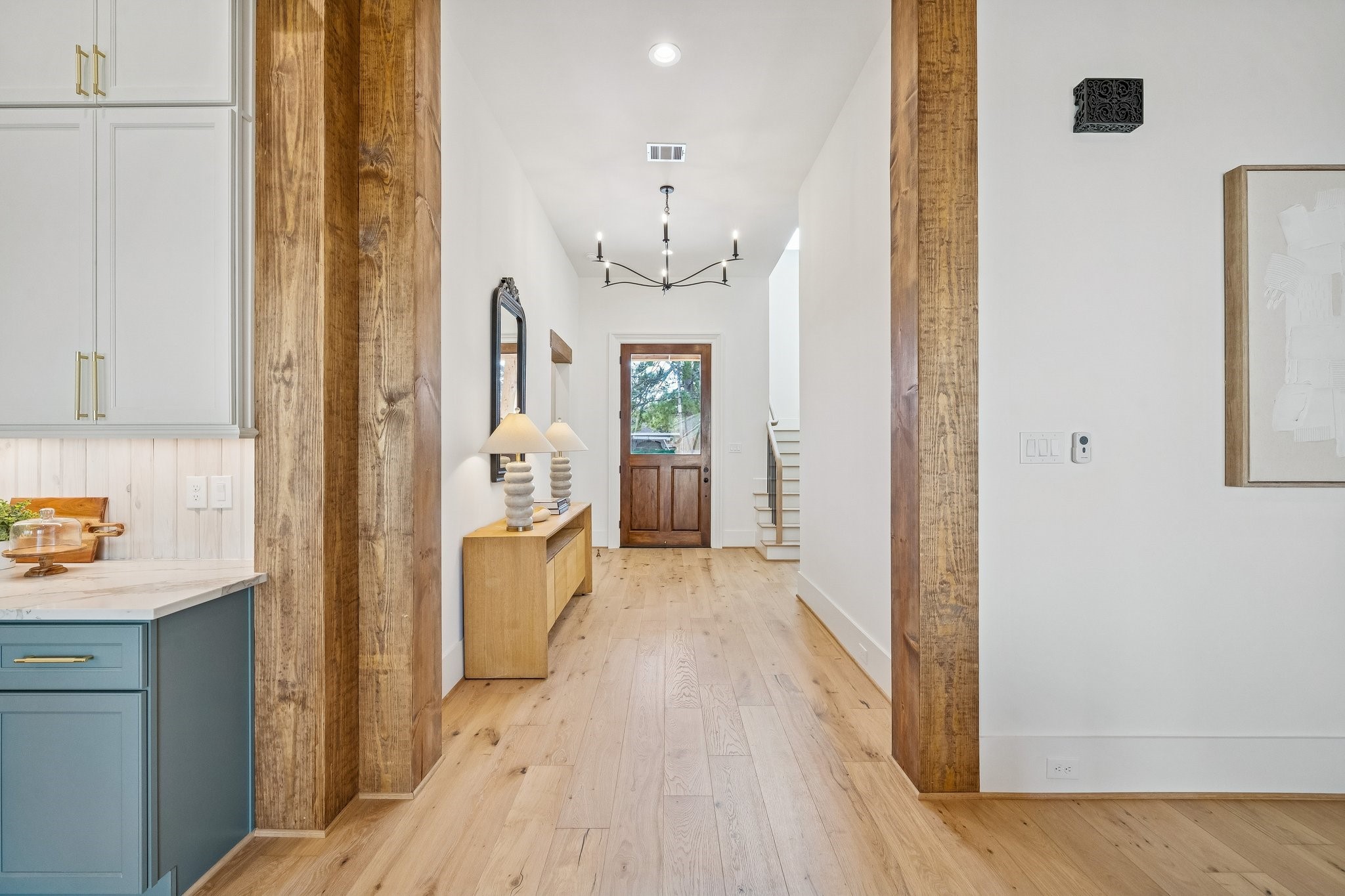511 Graceland Street Houston, TX 77009 - Photo 5 of 45 From the living room with wood framed cased opening looking back at the impressive front door.