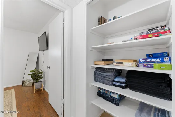 a room with toys and wooden floor