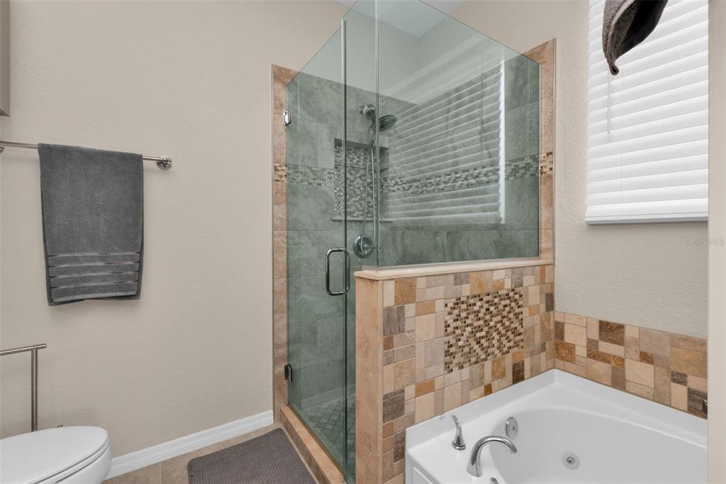 25409 Durango Court Punta Gorda, FL 33955 - Photo 30 of 46 a bathroom with a toilet and a shower