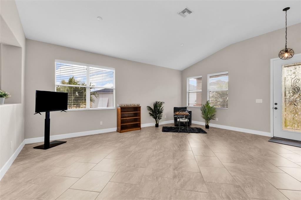 25409 Durango Court Punta Gorda, FL 33955 - Photo 6 of 46 a view of livingroom with furniture and window