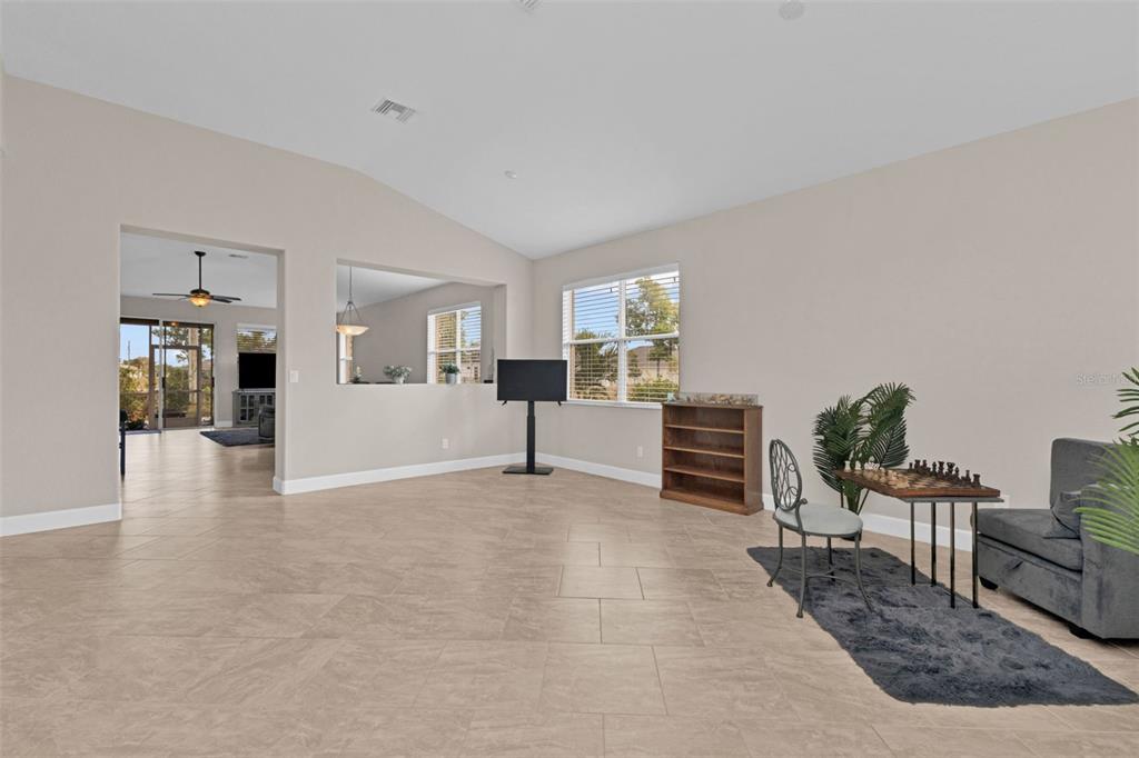 25409 Durango Court Punta Gorda, FL 33955 - Photo 7 of 46 a view of a livingroom with furniture and an empty room