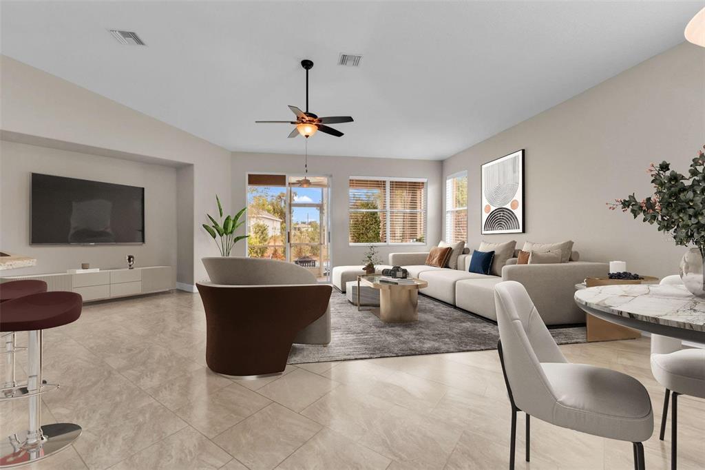 25409 Durango Court Punta Gorda, FL 33955 - Photo 10 of 46 a living room with furniture and a flat screen tv