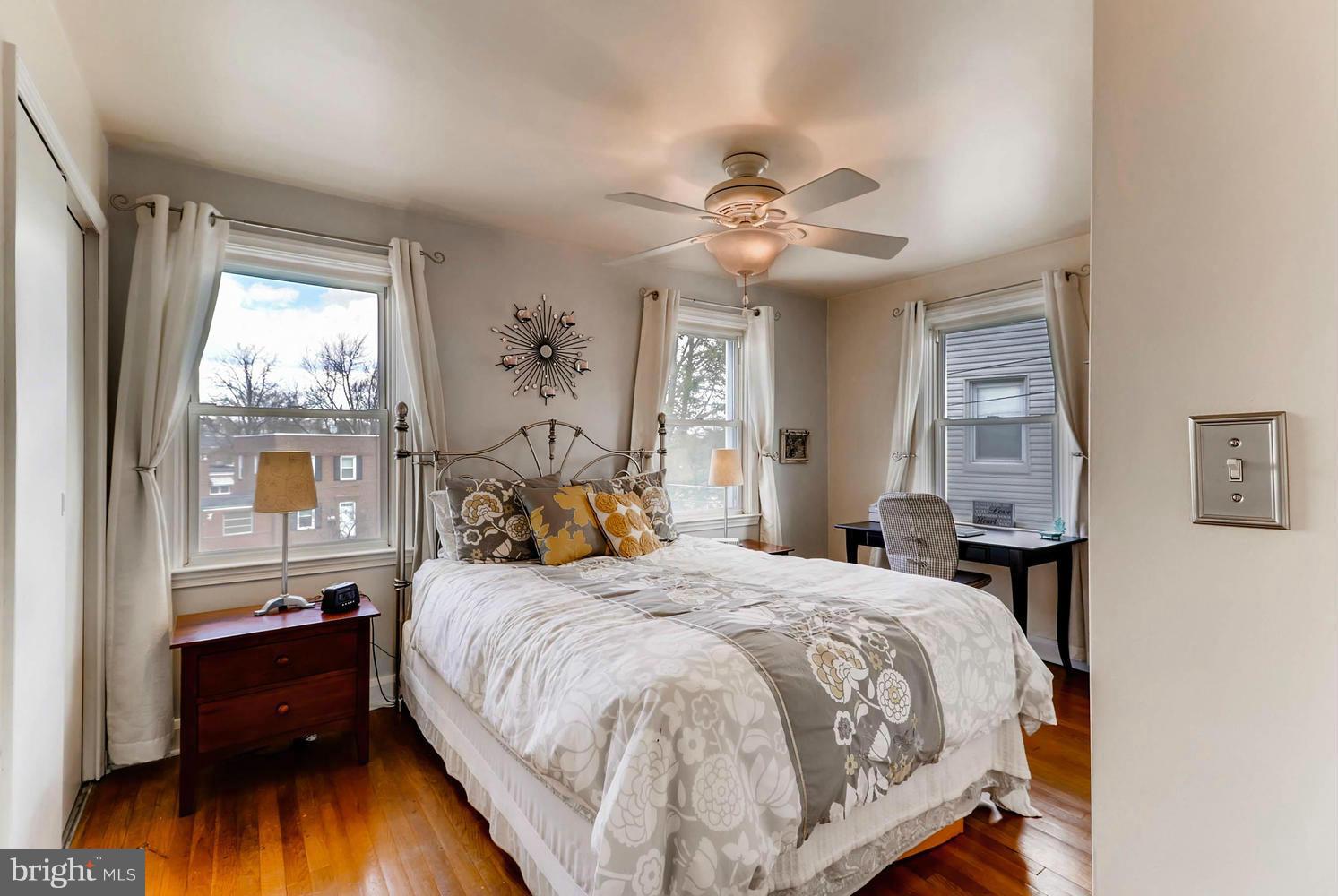 1753 Amuskai Road Baltimore, MD 21234 - Photo 13 of 28 a bed sitting in a bedroom next to a window
