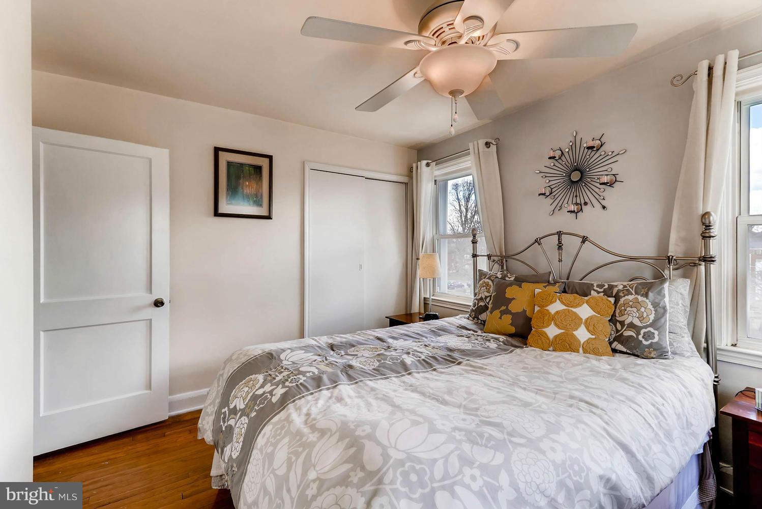 1753 Amuskai Road Baltimore, MD 21234 - Photo 15 of 28 a bedroom with a bed and wooden floor