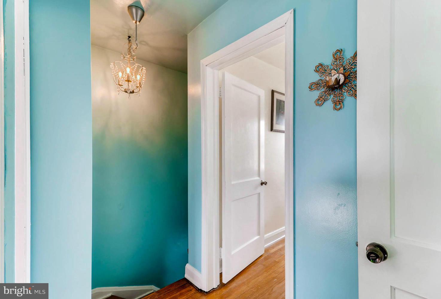 1753 Amuskai Road Baltimore, MD 21234 - Photo 21 of 28 a view of a hallway with wooden floor