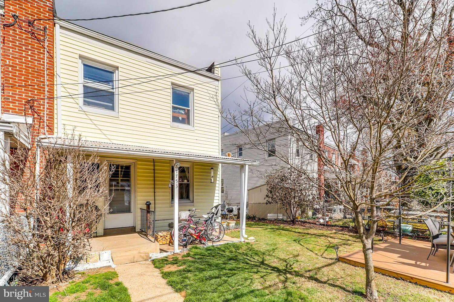 1753 Amuskai Road Baltimore, MD 21234 - Photo 27 of 28 a view of a house with backyard porch and sitting area