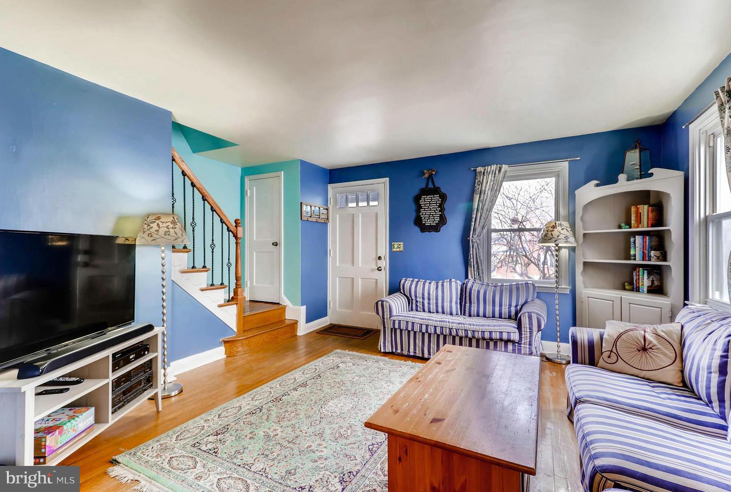 1753 Amuskai Road Baltimore, MD 21234 - Photo 5 of 28 a living room with furniture and a flat screen tv