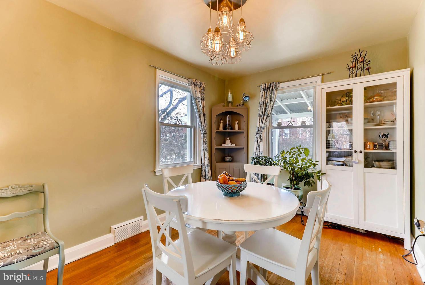 1753 Amuskai Road Baltimore, MD 21234 - Photo 6 of 28 a view of a dining room with furniture and wooden floor