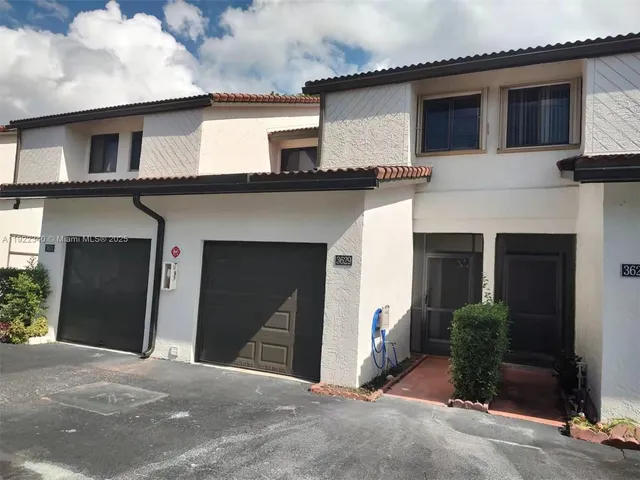 a house view with a outdoor space