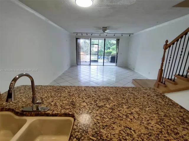 a room with a sink and a window