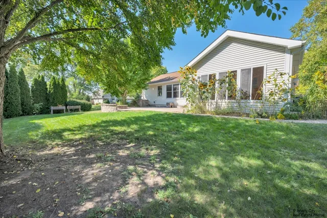 a flower plants in front of a house