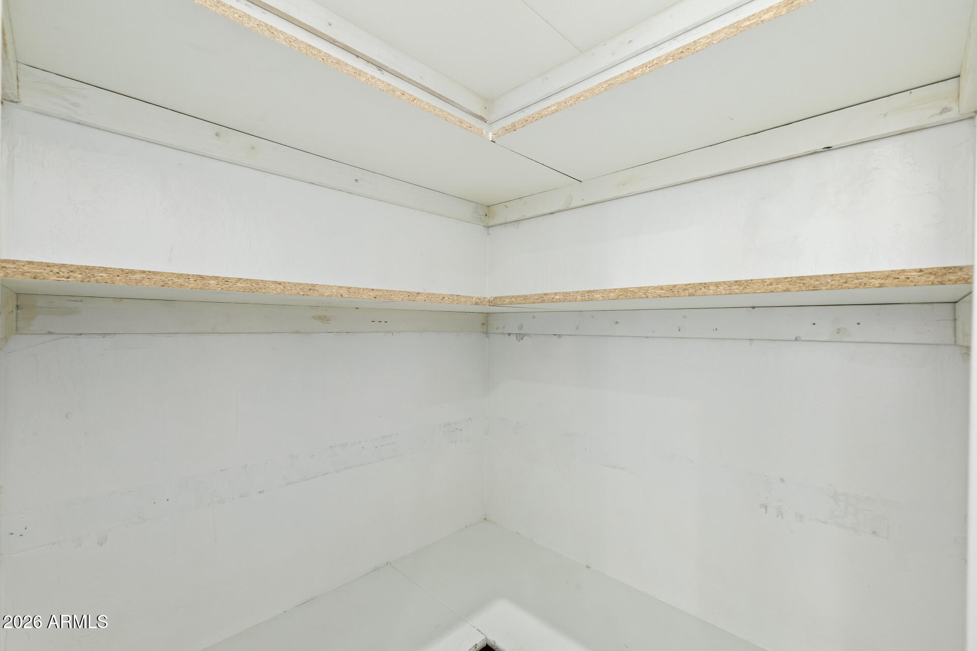 8320 West Apache Street Tolleson, AZ 85353 - Photo 24 of 31 a view of a room with shelf