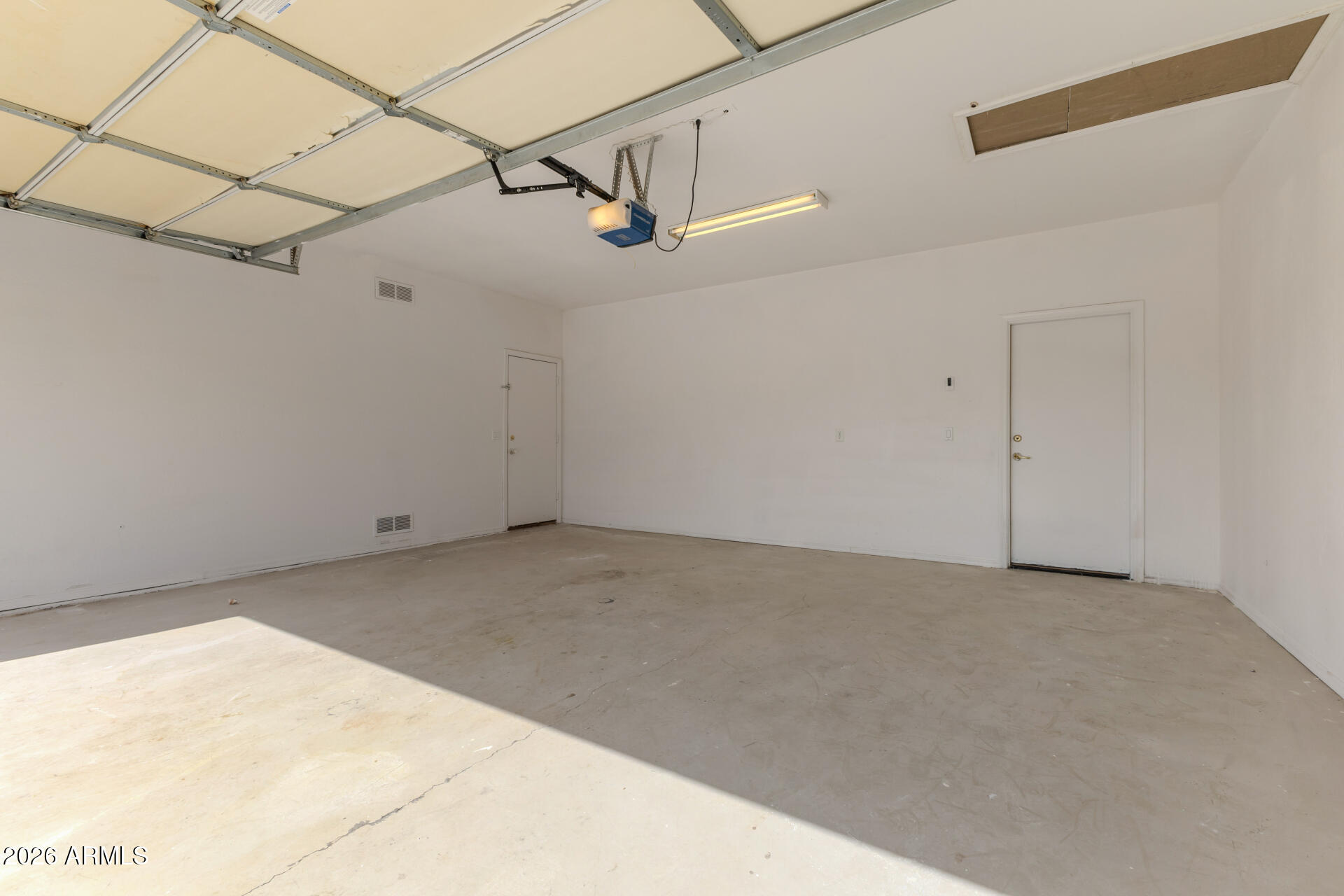 8320 West Apache Street Tolleson, AZ 85353 - Photo 26 of 31 a view of a garage