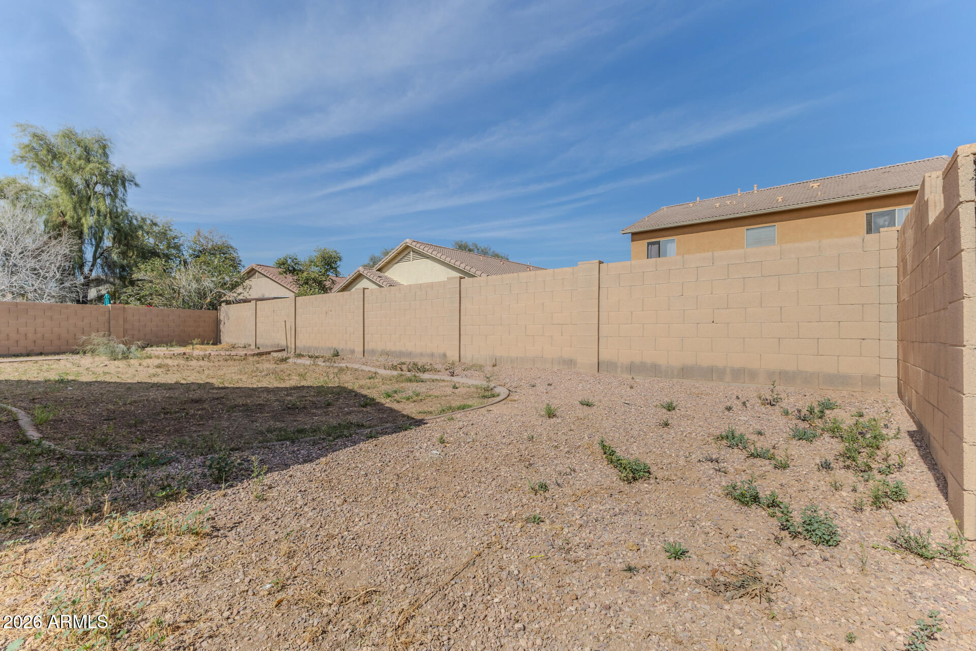 8320 West Apache Street Tolleson, AZ 85353 - Photo 27 of 31 a view of a backyard of the house