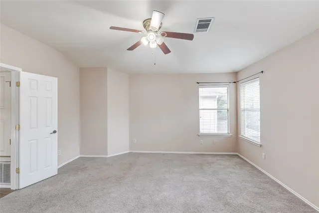a bathroom with a shower sink and mirror