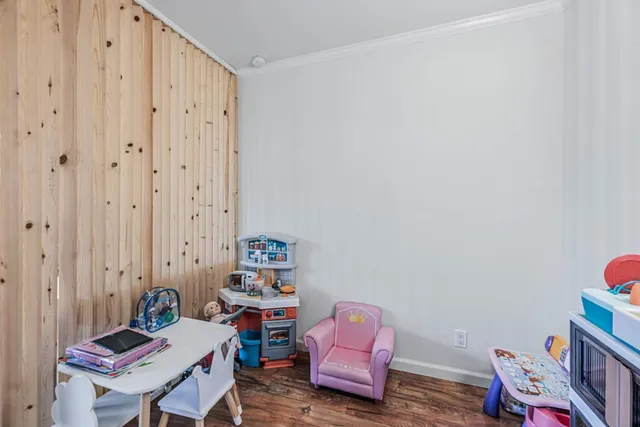 a room with furniture and a gate