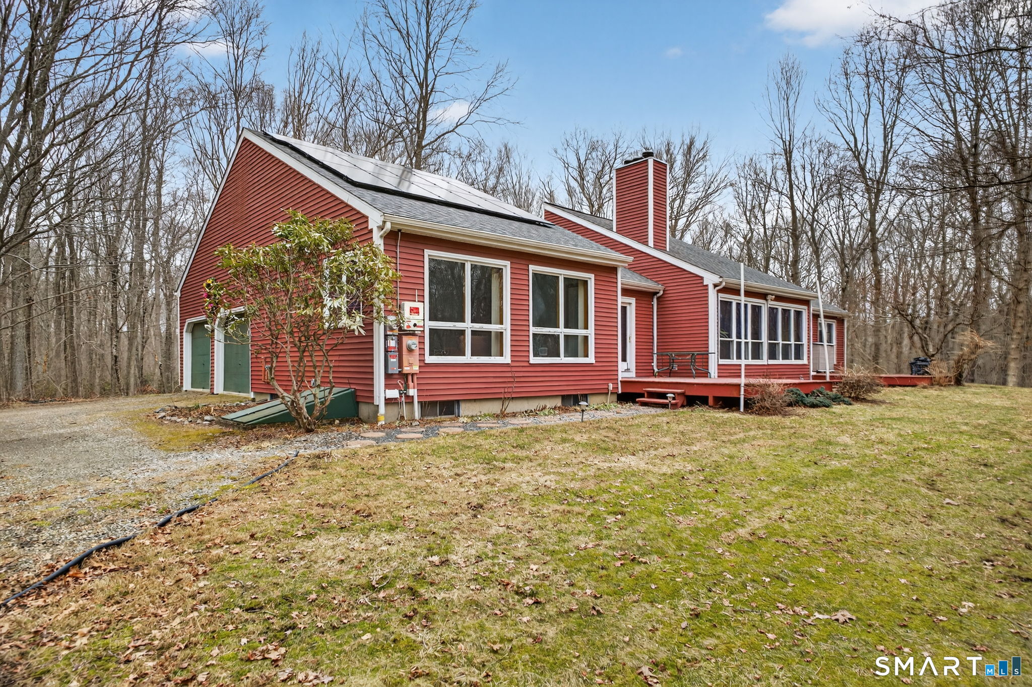 24 Tower Hill Road Clinton, CT 06413 - Photo 3 of 37 a view of a house with a yard and wooden fence