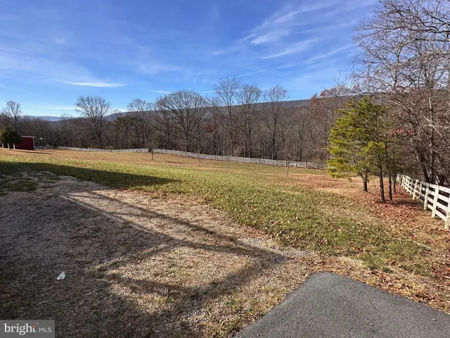 a view of a yard with an outdoor space