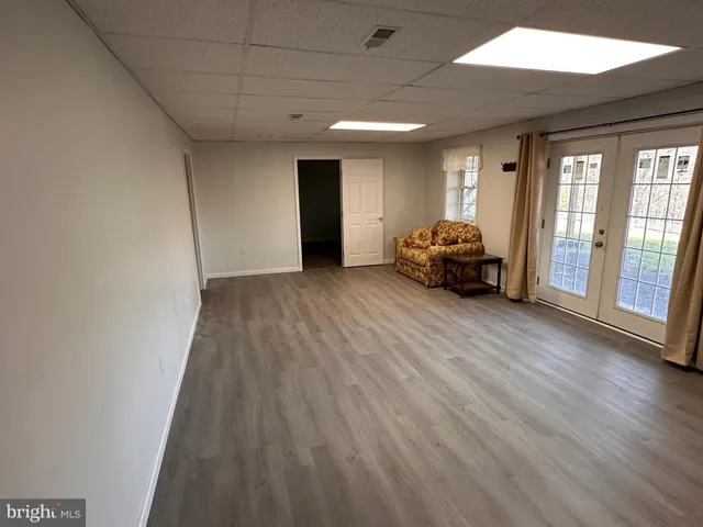a view of livingroom with furniture and wooden floor