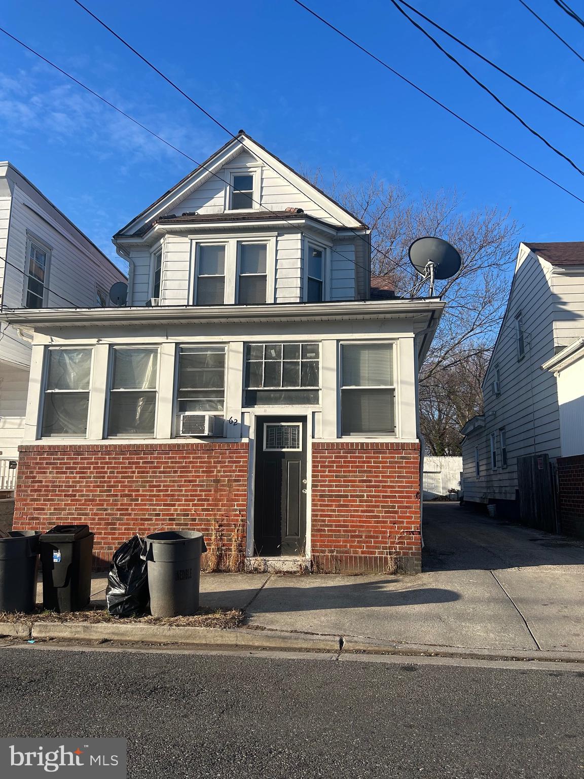 62 West Pitman Street Penns Grove, NJ 08069 - Photo 1 of 4 a front view of a house with a yard