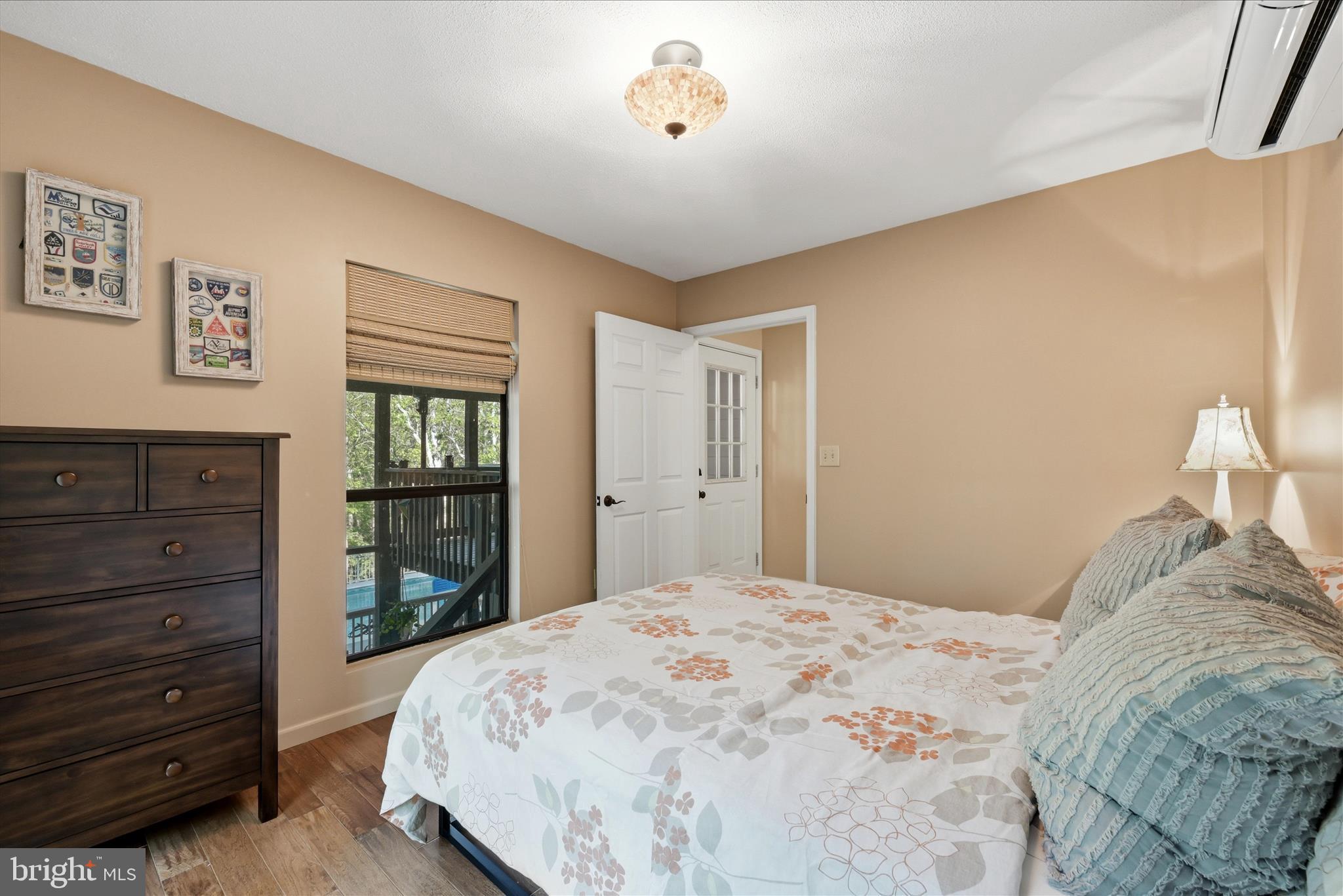 1856 Crossings View Road Paw Paw, WV 25434 - Photo 21 of 45 a bedroom with a bed and a dresser
