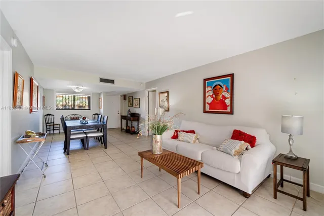 a living room with furniture and a couch