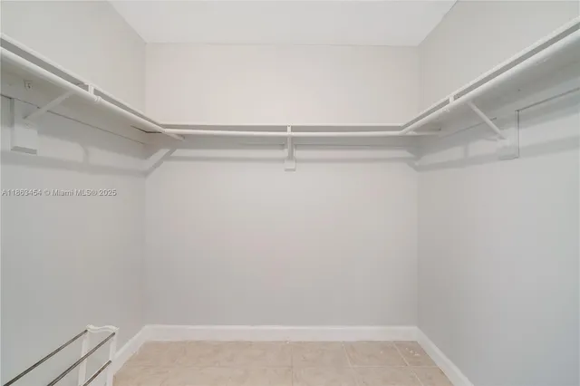 a view of an empty walk in closet