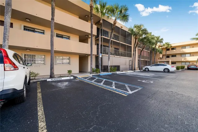a view of a street with cars