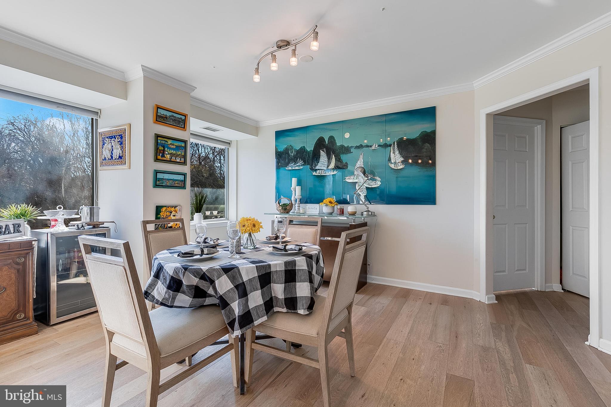 5450 Whitley Park Terrace, Unit 209 Bethesda, MD 20814 - Photo 15 of 29 a view of a dining room with furniture window and outside view