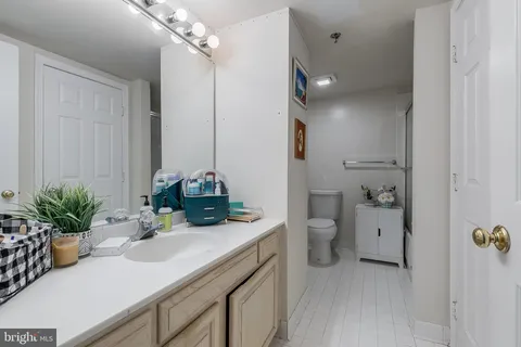 a view of balcony with wooden floor and outdoor seating
