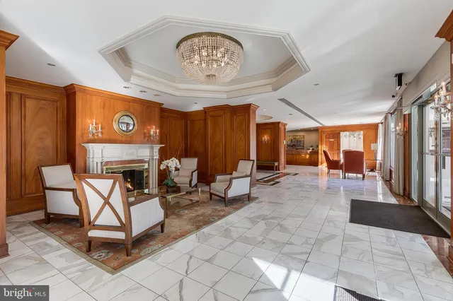 a view of a lobby with furniture and carpet
