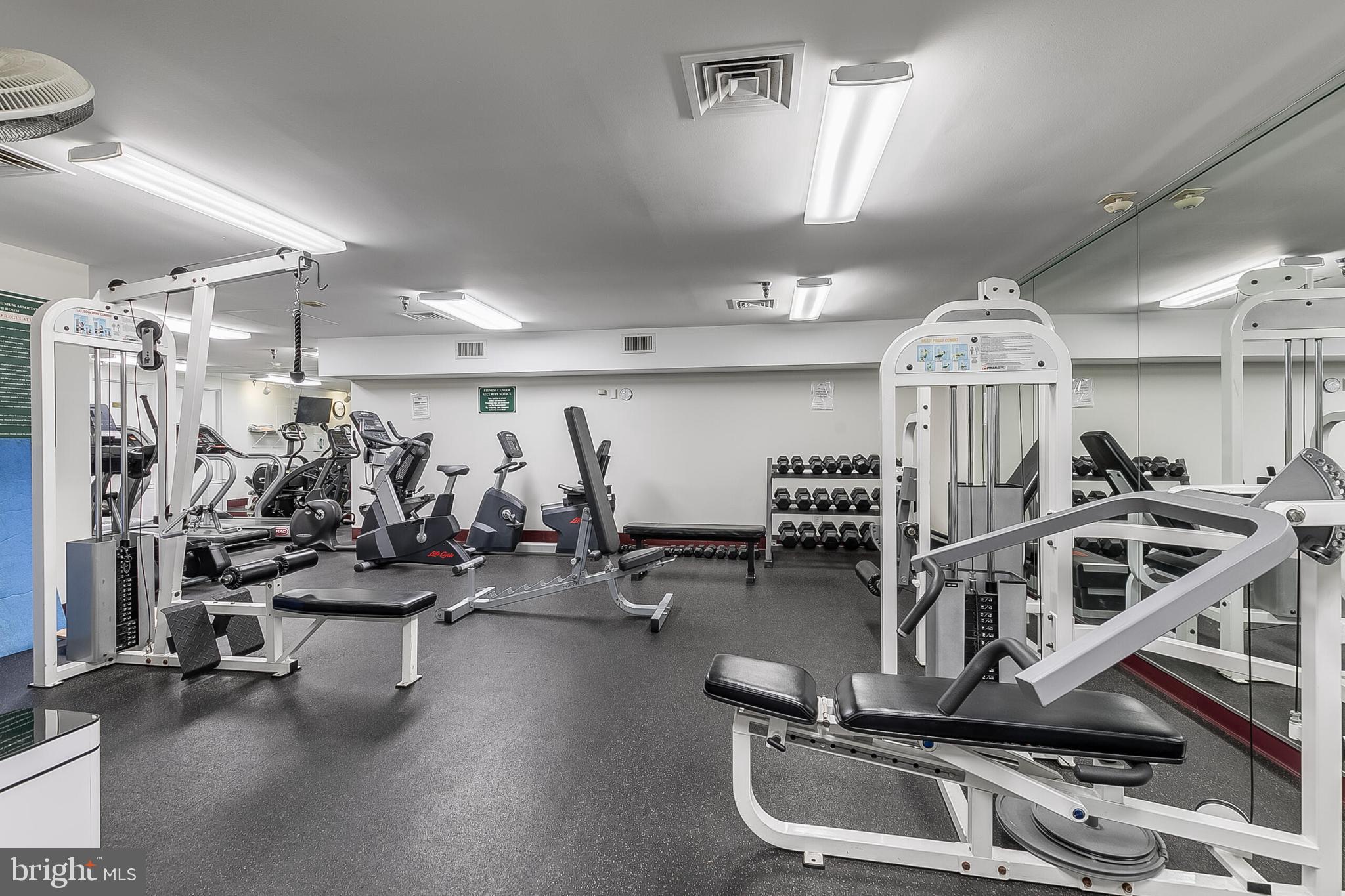 5450 Whitley Park Terrace, Unit 209 Bethesda, MD 20814 - Photo 9 of 29 a view of a room with gym equipment