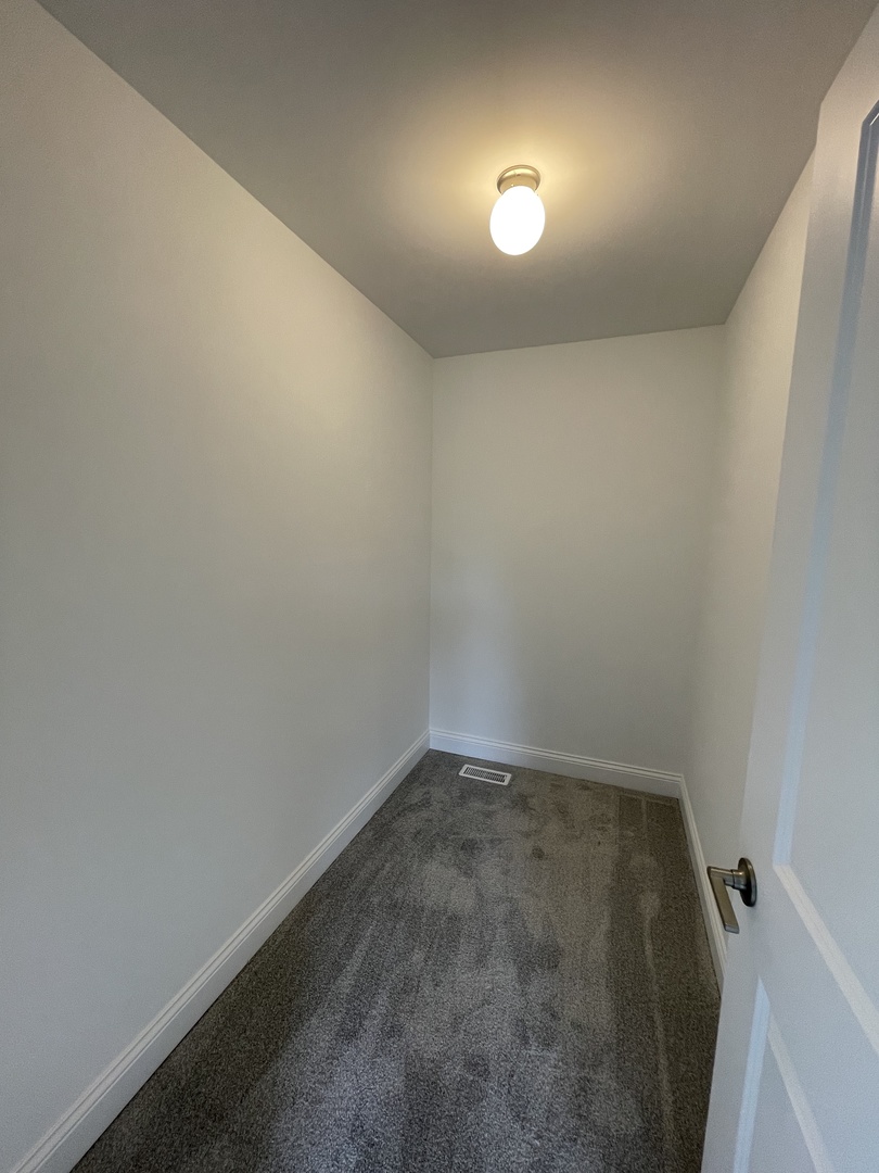 18800 Sara Road Mokena, IL 60448 - Photo 17 of 24 an empty room with a workbench
