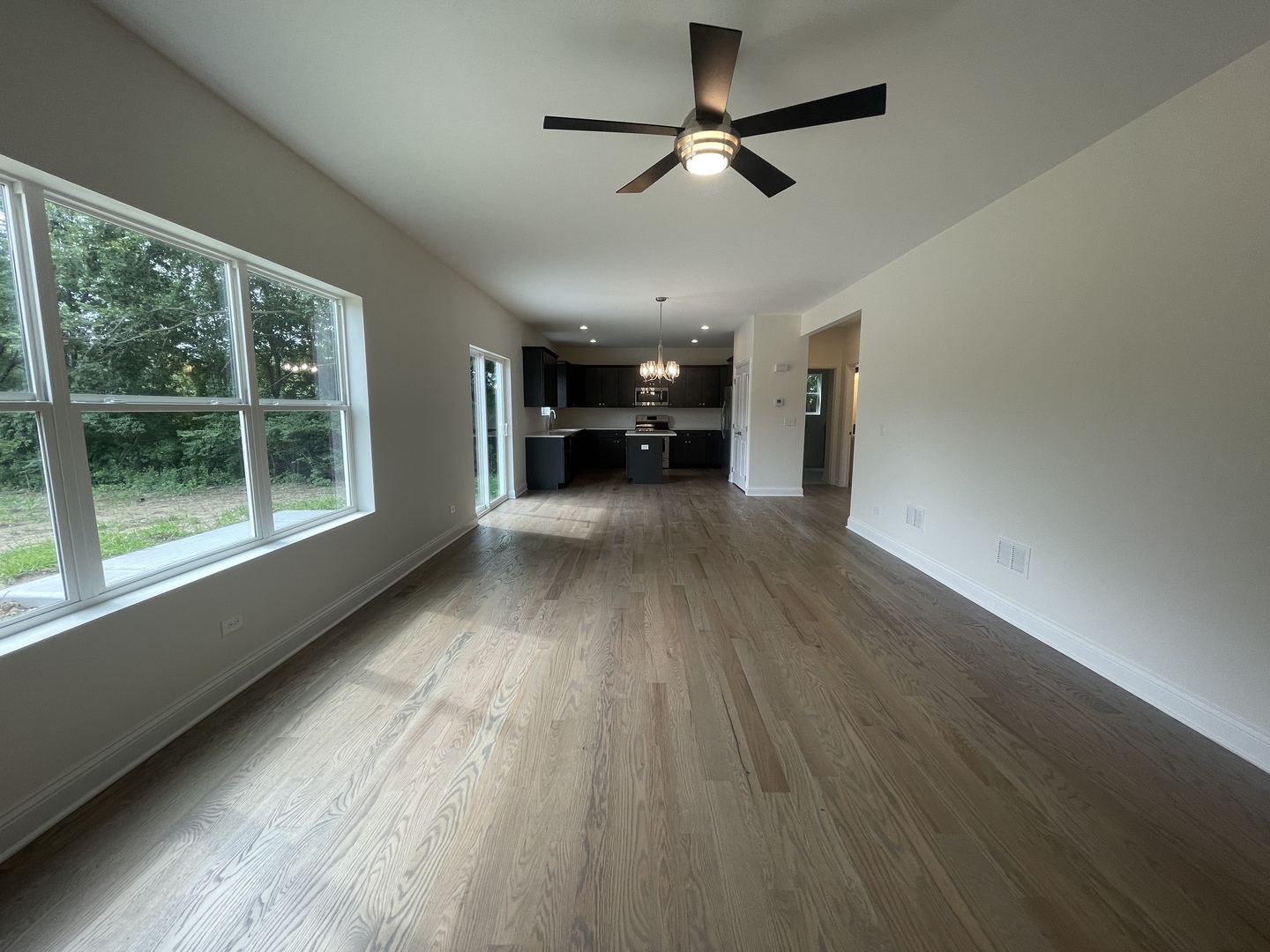 18800 Sara Road Mokena, IL 60448 - Photo 4 of 24 wooden floor in an empty room with a window