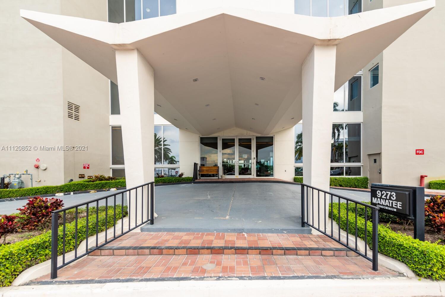 9273 Collins Avenue, Unit 801 Surfside, FL 33154 - Photo 34 of 47 a view of a house with wooden fence