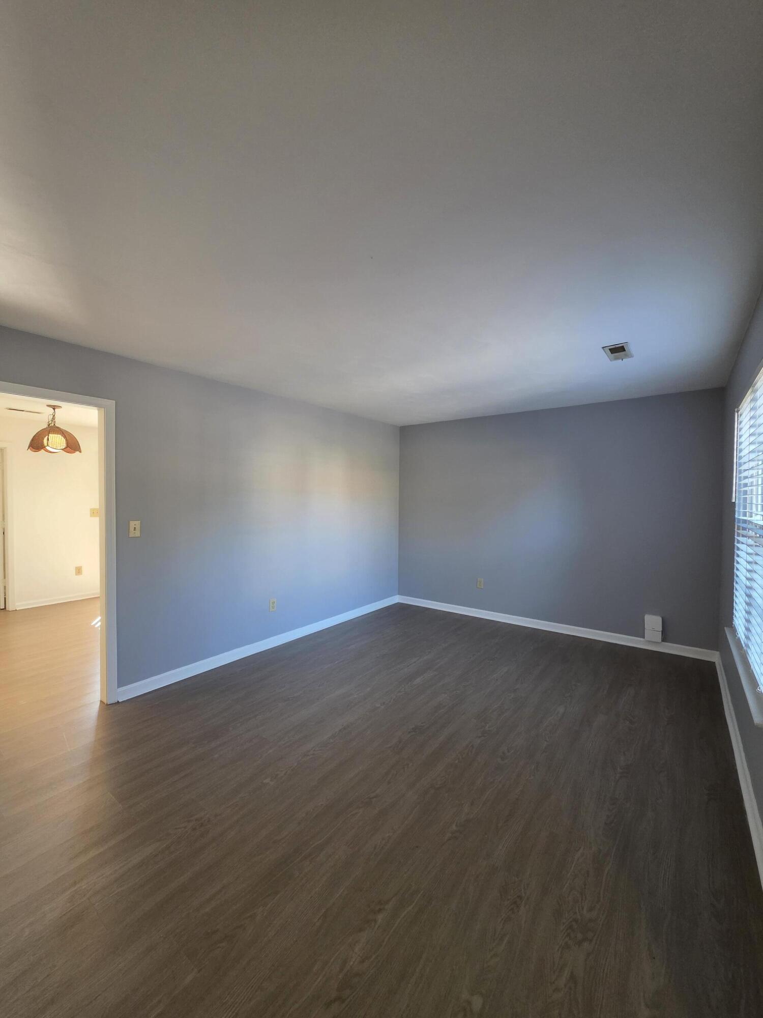 800 Kerner Avenue Salem, VA 24153 - Photo 2 of 16 a view of an empty room and wooden floor