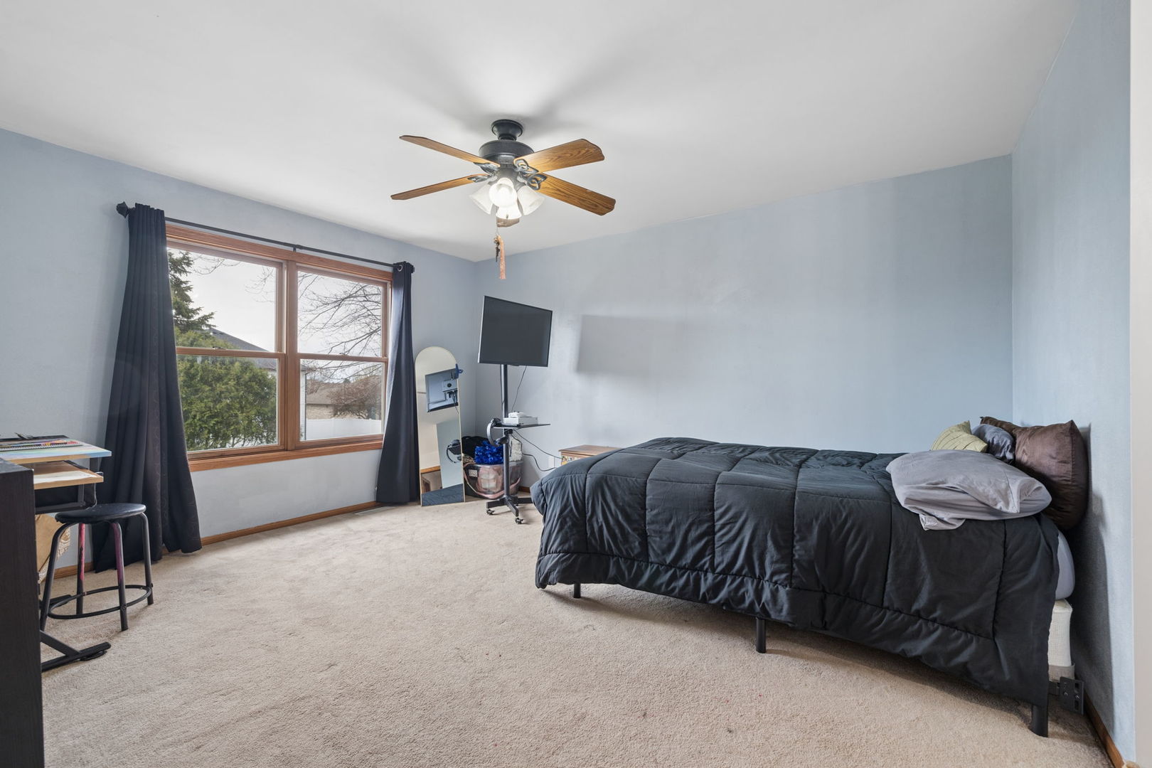611 Prairie View Lane Hinckley, IL 60520 - Photo 27 of 40 a bedroom with a bed dresser and a window