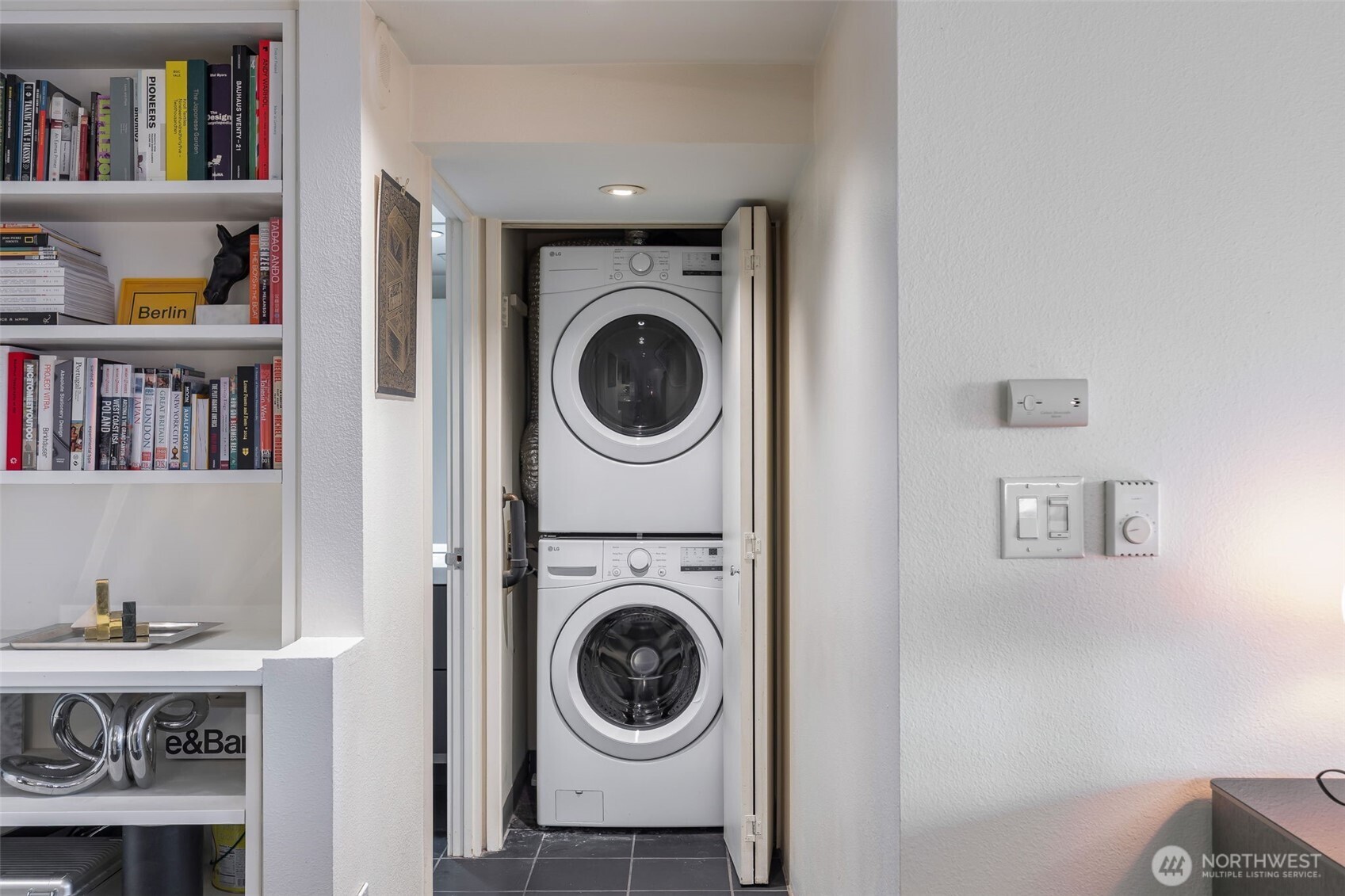 1415 2nd Avenue, Unit 2108 Seattle, WA 98101 - Photo 11 of 27 a view of living room washer and dryer