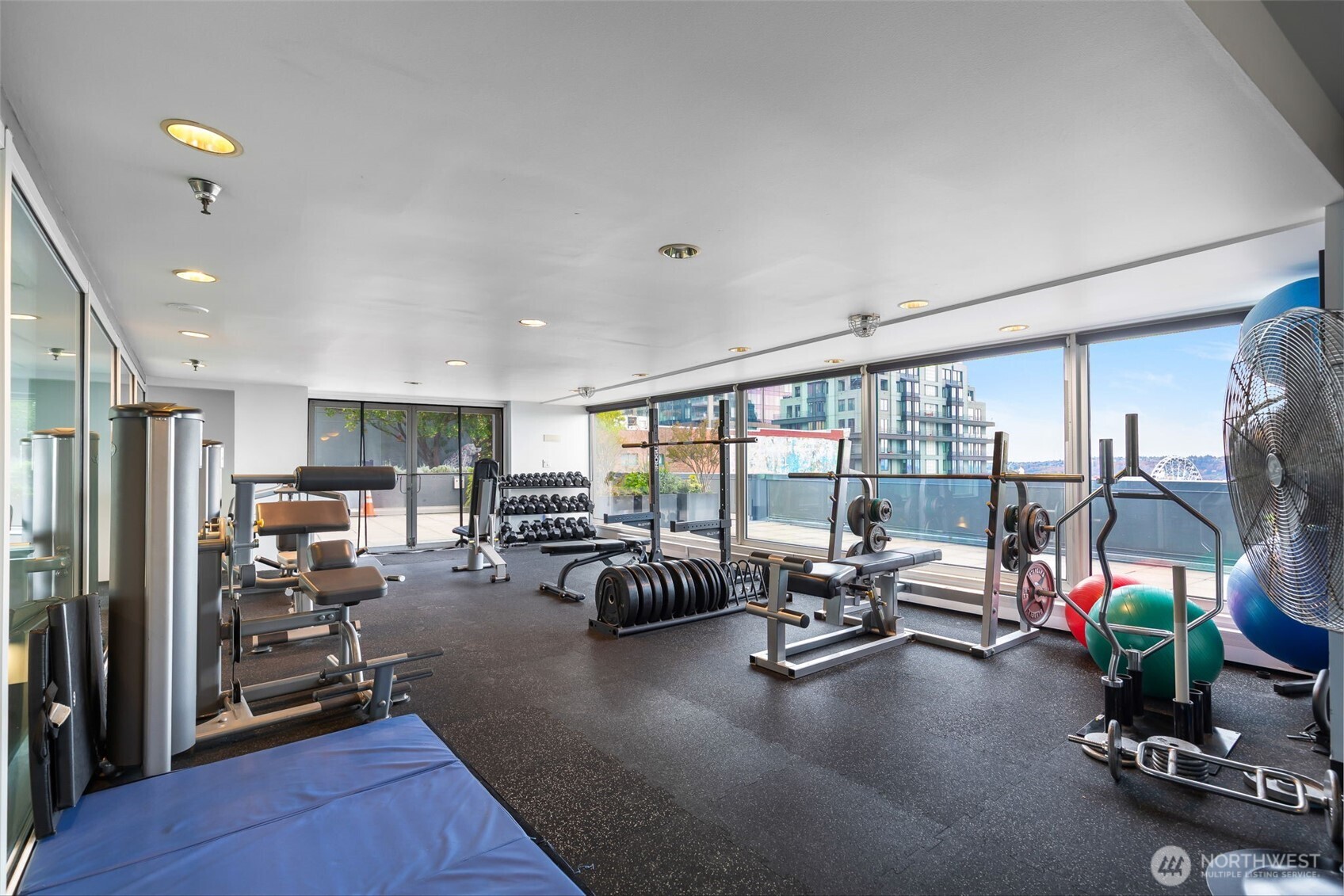 1415 2nd Avenue, Unit 2108 Seattle, WA 98101 - Photo 16 of 27 a view of a room with gym equipment