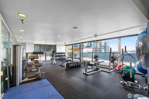 a view of pool with seating area