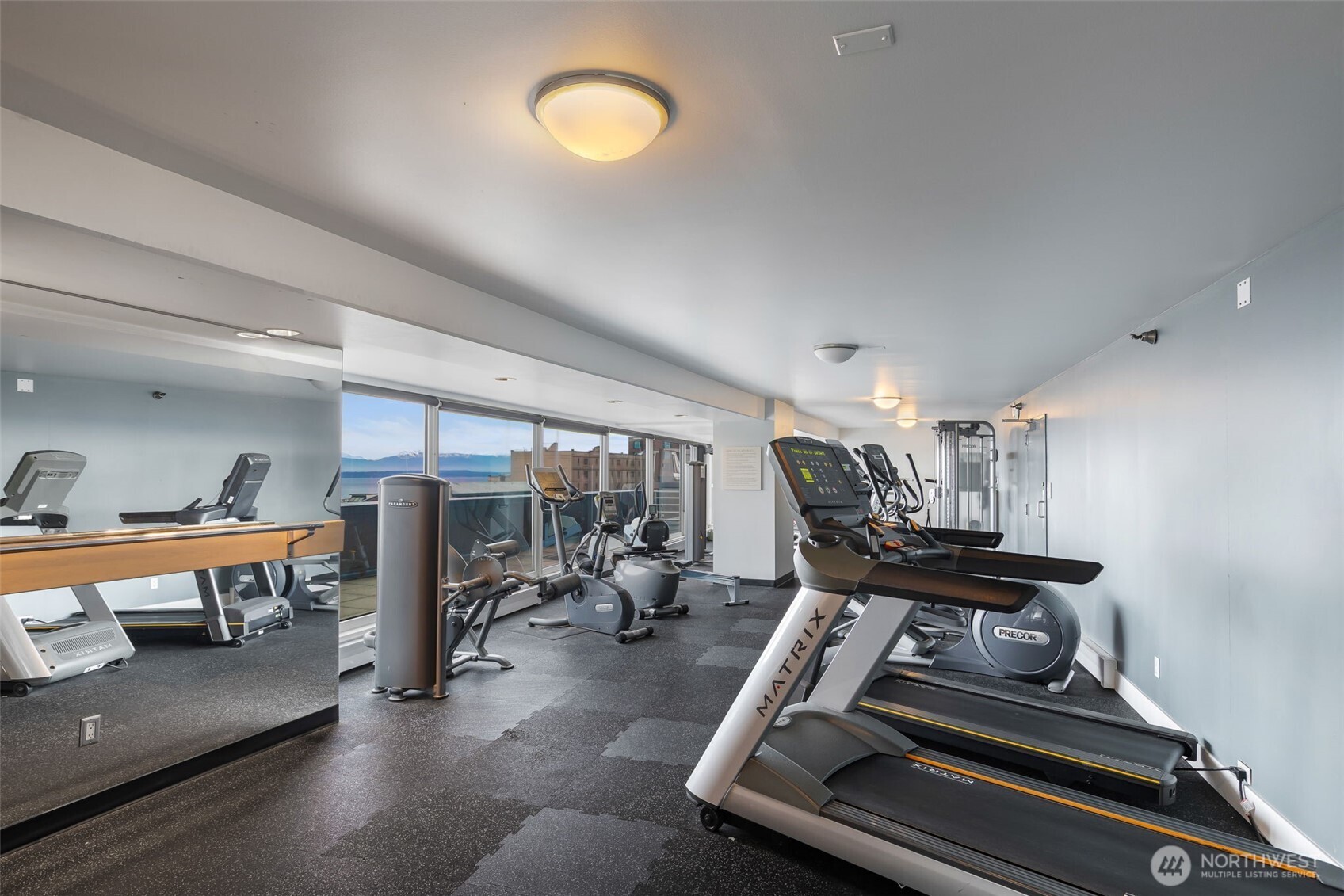 1415 2nd Avenue, Unit 2108 Seattle, WA 98101 - Photo 19 of 27 a view of a room with gym equipment