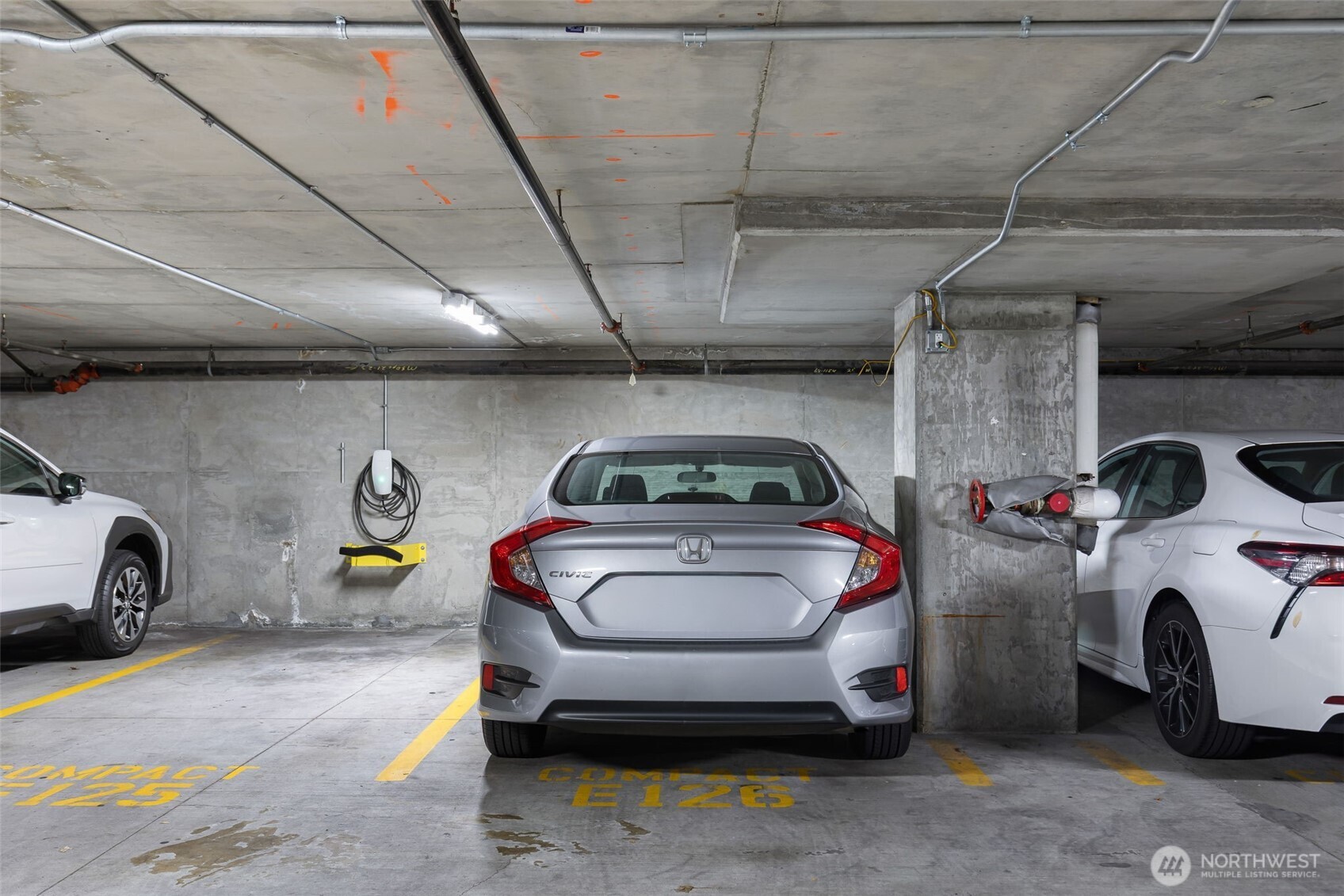 1415 2nd Avenue, Unit 2108 Seattle, WA 98101 - Photo 22 of 27 a car and bike parked