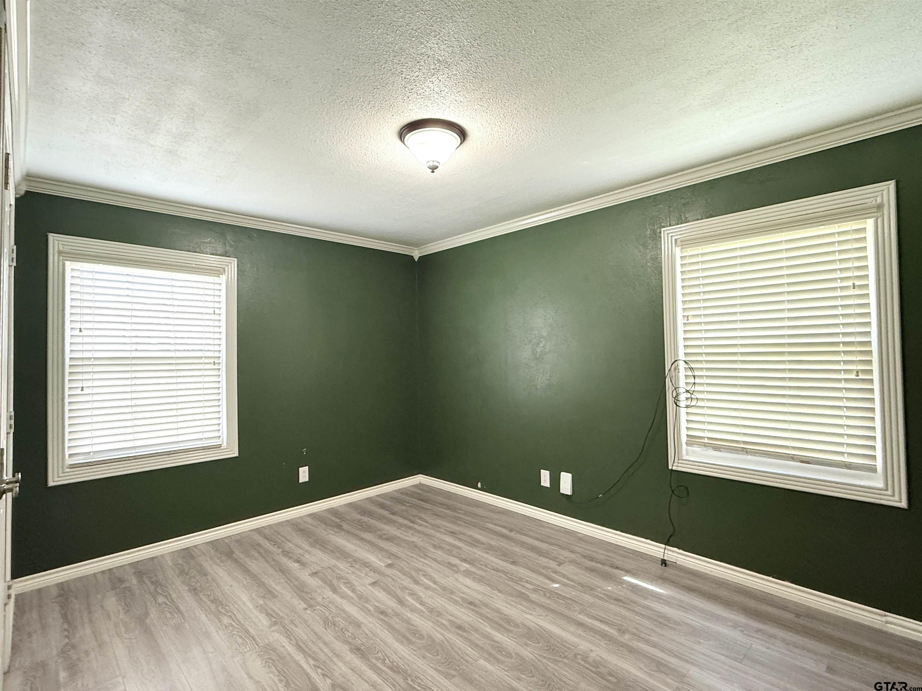 404 Beckley Street Kilgore, TX 75662 - Photo 10 of 20 a view of a room that has a window in it