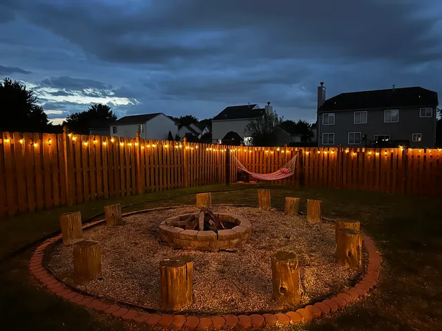 a view of a park with large trees