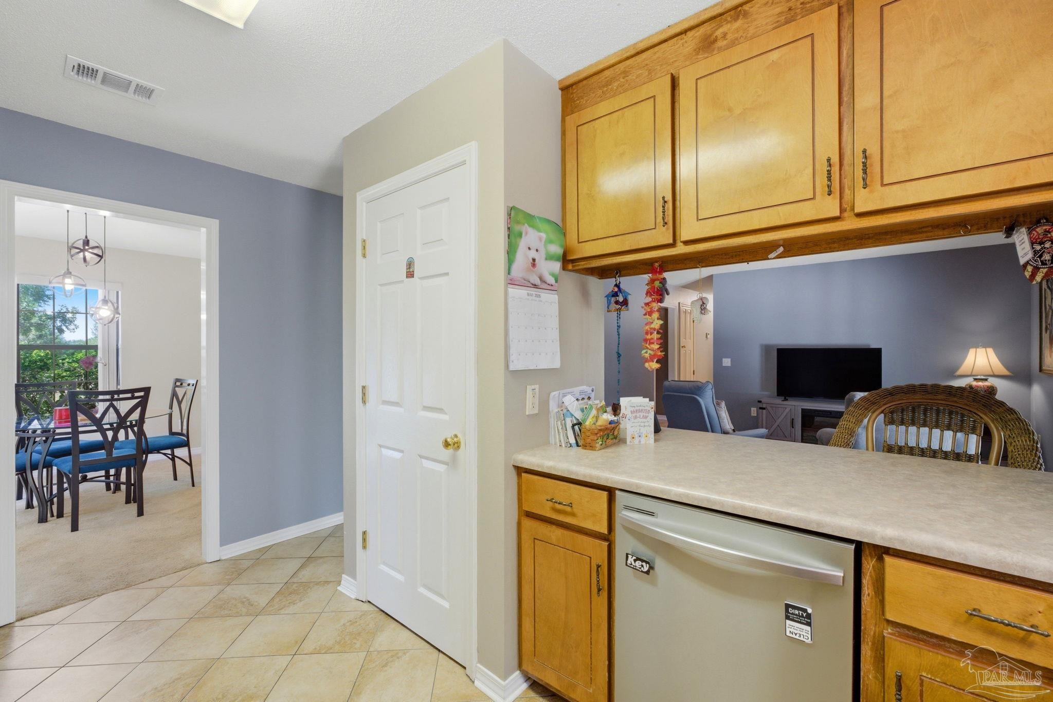 5121 Keyser Mill Road Baker, FL 32531 - Photo 11 of 52 a kitchen with a sink cabinets and appliances